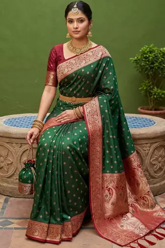 Green soft banarasi silk blend saree with zari weaving meenakari design