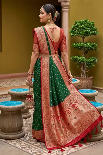 Green soft banarasi silk blend saree with zari weaving meenakari design