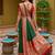 Green soft banarasi silk blend saree with zari weaving meenakari design