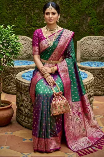 Sea green soft banarasi silk blend saree with zari weaving meenakari design