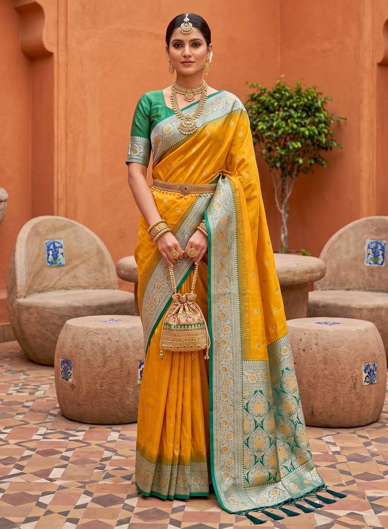 Yellow soft banarasi silk blend saree with zari weaving meenakari design