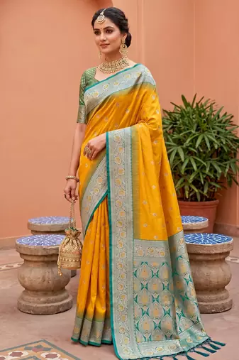 Yellow soft banarasi silk blend saree with zari weaving meenakari design