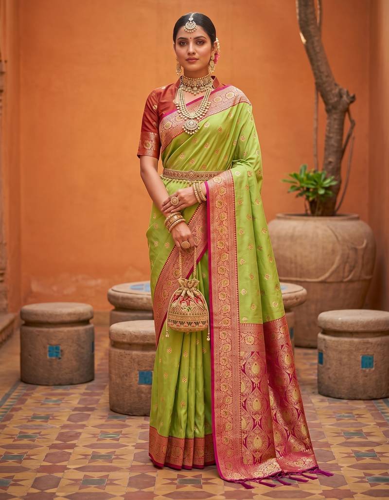Parrot green soft banarasi silk blend saree with zari weaving meenakari design