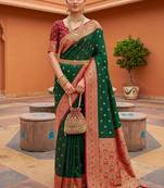 Green soft banarasi silk blend saree with zari weaving meenakari design