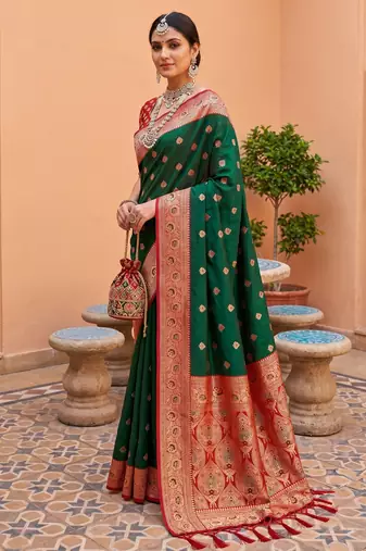 Green soft banarasi silk blend saree with zari weaving meenakari design