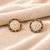 Round pearl cluster stud earrings with ruby, emerald and diamond accents, gold-toned, traditional indian style