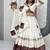 NAVRATRI WEAR WHITE COLOR COTTON PRINT & CONVAS PATTA WORK LEHENGA CHOLI FREE SIZE FULL STITCHED.