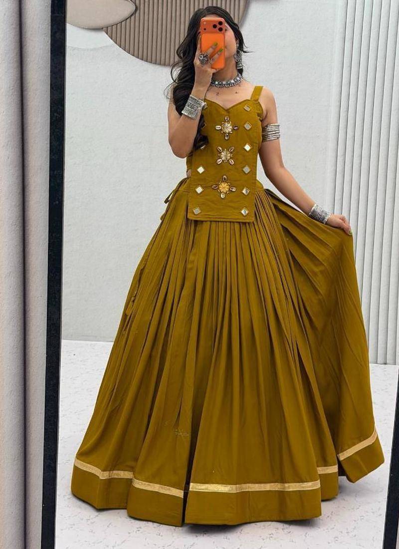 NAVRATRI WEAR MUSTARD COLOR SOLID COTTON LEHENGA CHOLI FREE SIZE FULL STITCHED.
