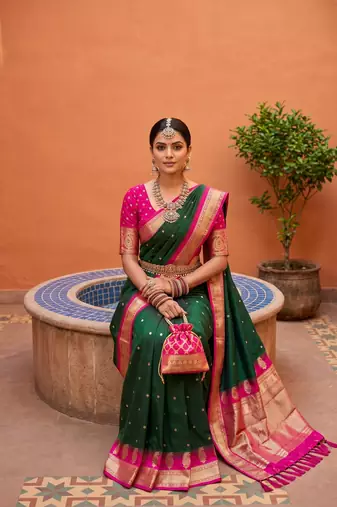 Green soft silk blend saree with zari weaving meenakari design