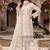 Cream heavy chiffon embroidered suit with hand moti & khatli work