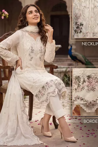 Cream heavy chiffon embroidered suit with hand moti & khatli work