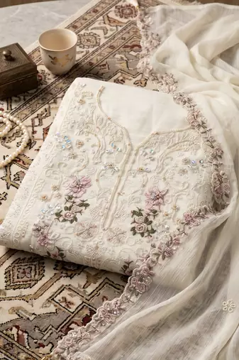 Cream heavy chiffon embroidered suit with hand moti & khatli work