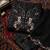 Black heavy chiffon embroidered suit with hand moti & khatli work