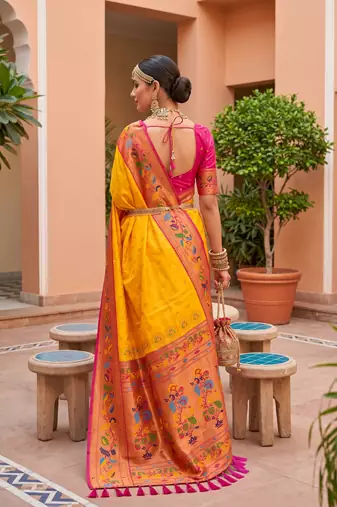 Yellow  faux banarasi silk saree with paithani rich weaved pallu and blouse