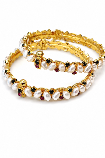 Pearl bangle set with ruby and black stone accents, gold-tone, openable