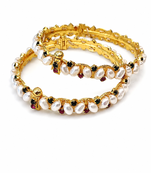 Pearl bangle set with ruby and black stone accents, gold-tone, openable