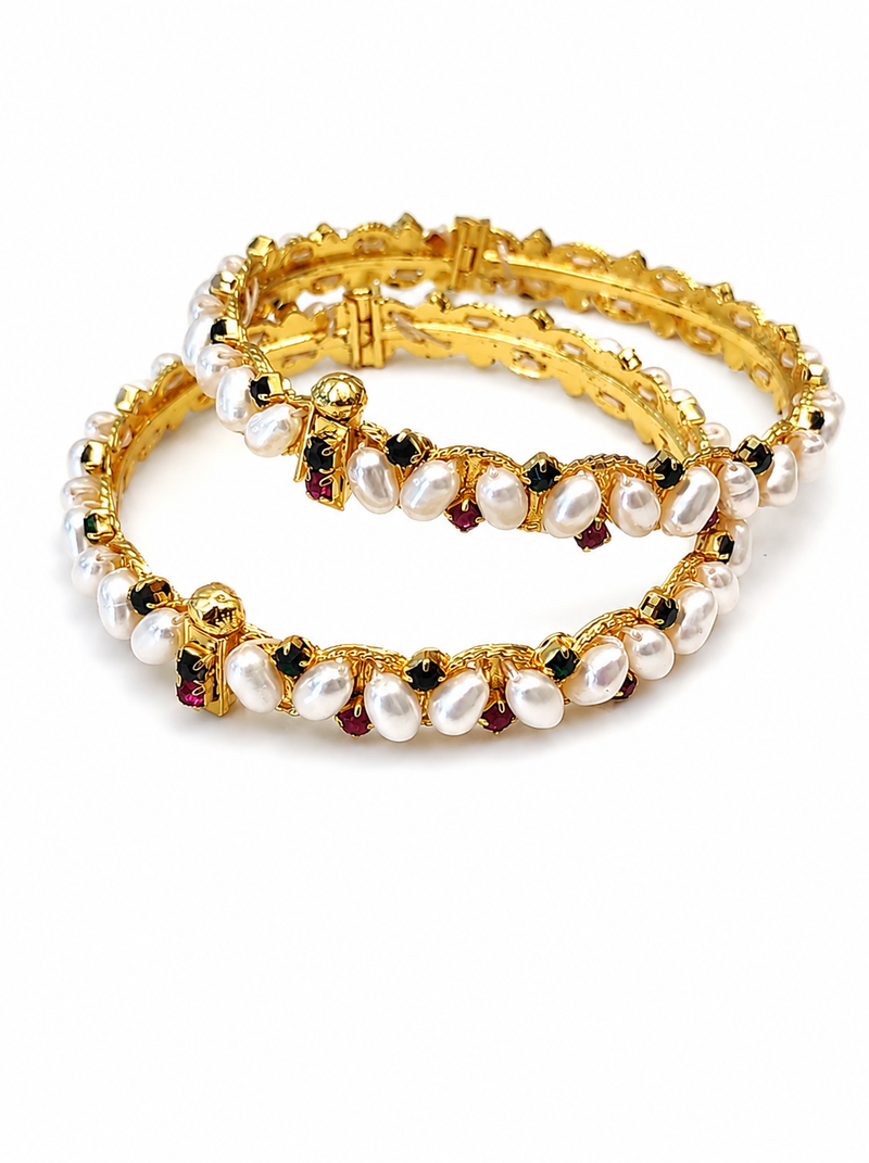 Pearl bangle set with ruby and black stone accents, gold-tone, openable