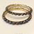 Pearl bangle set, dark iridescent freshwater pearls, gold-tone base