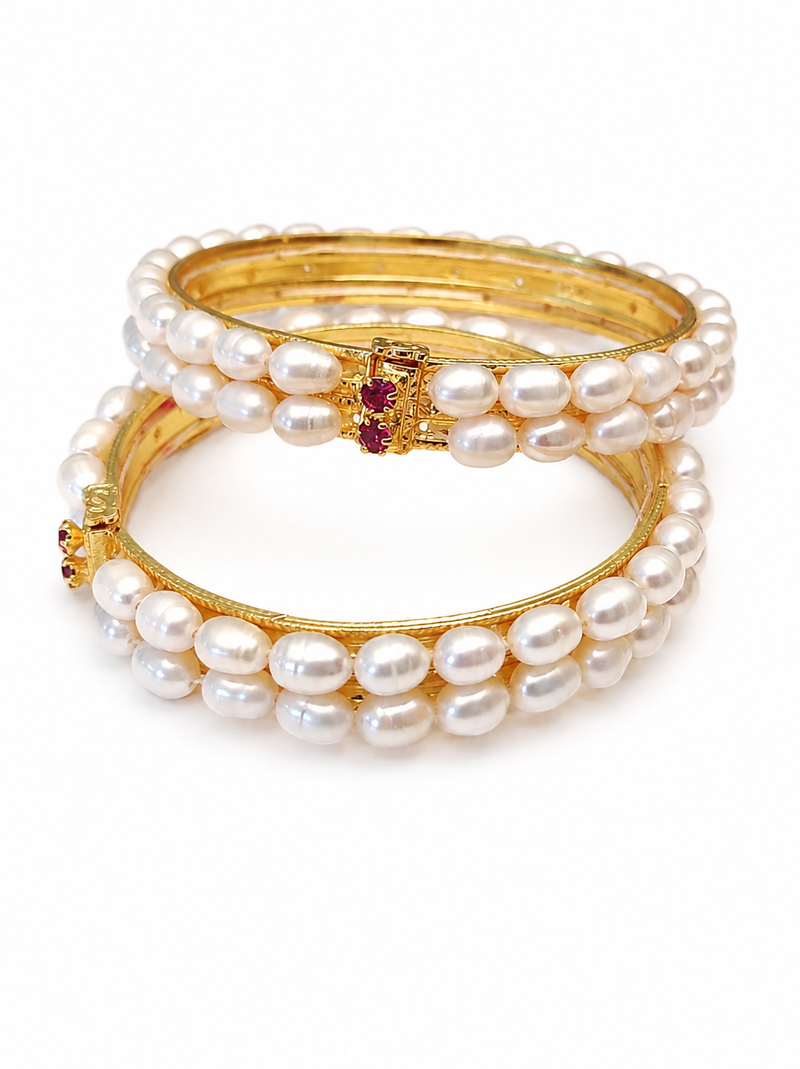 Pearl bangle with ruby accent, gold-toned, double row, openable,
