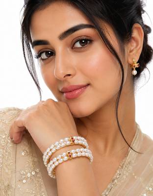 Pearl bangle with ruby accent, gold-toned, double row, openable, 2