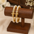 Pearl bangle set with kundan work, gold-toned, openable, 