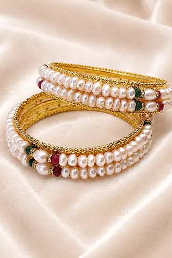 Pearl bangle with ruby and emerald beads, gold-toned, traditional style,
