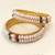 Pearl bangle with ruby and emerald beads, gold-toned, traditional style,