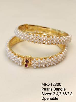 Pearl bangle set with red stone accents, gold-toned, openable,  4