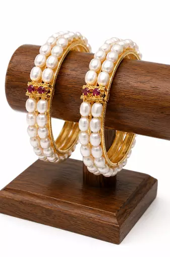 Pearl bangle with ruby accent, gold-toned, double row, openable,