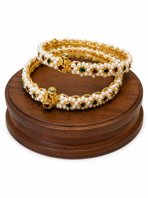 Pearl bangle with red and green stone accents, gold-toned, openable,  3