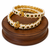 Pearl bangle with red and green stone accents, gold-toned, openable, 