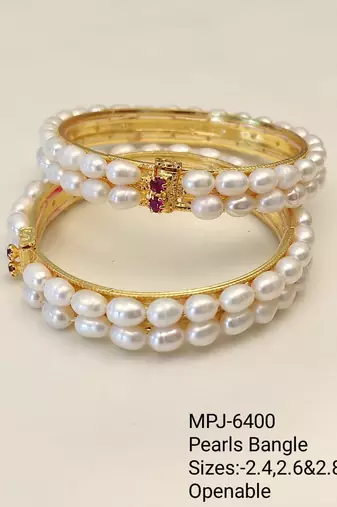 Pearl bangle with ruby accent, gold-toned, double row, openable,