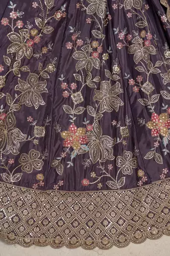 Trendy Purple Lehenga choli with Elegant Golden Floral Design