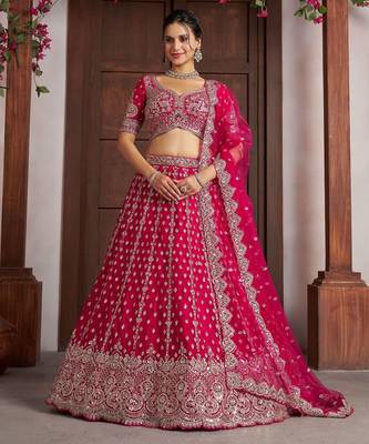Elegant Rani Pink Lehenga with Heavy Silver zari and  Beads Detailing. 1
