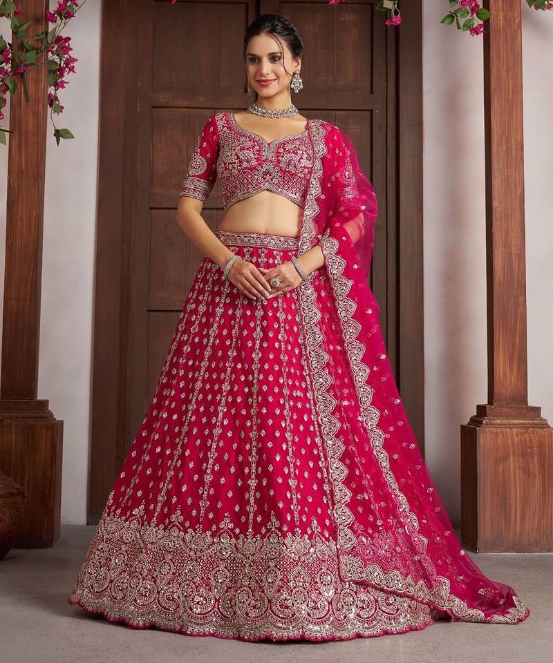 Elegant Rani Pink Lehenga with Heavy Silver zari and  Beads Detailing.