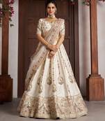 Luxurious White Lehenga with Elegant Thread & Peacock Design