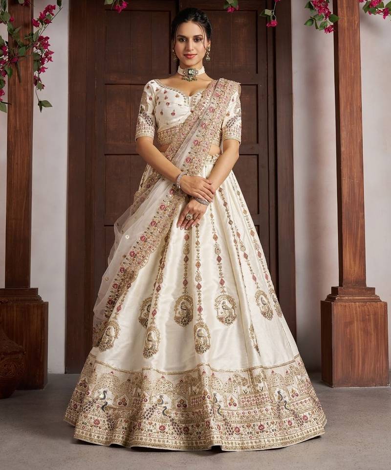 Luxurious White Lehenga with Elegant Thread & Peacock Design