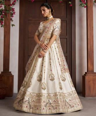 Luxurious White Lehenga with Elegant Thread & Peacock Design 2