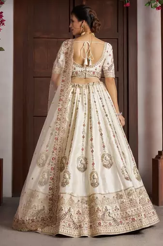 Luxurious White Lehenga with Elegant Thread & Peacock Design
