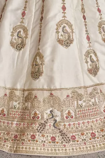 Luxurious White Lehenga with Elegant Thread & Peacock Design