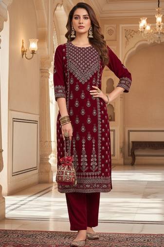 Women ethnic motifs printed thread work velvet kurta with trousers