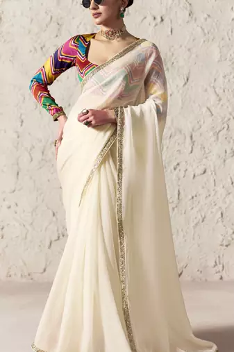 Off white embroidery work fancy fabric saree with blouse