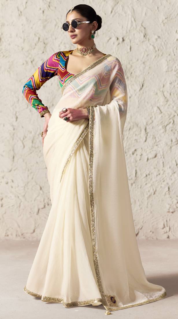 Off white embroidery work fancy fabric saree with blouse