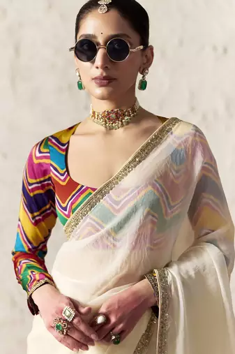 Off white embroidery work fancy fabric saree with blouse