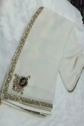 Off white embroidery work fancy fabric saree with blouse