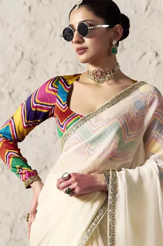 Off white embroidery work fancy fabric saree with blouse