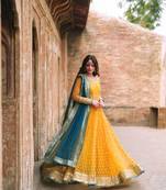 Yellow net thread flared gown set