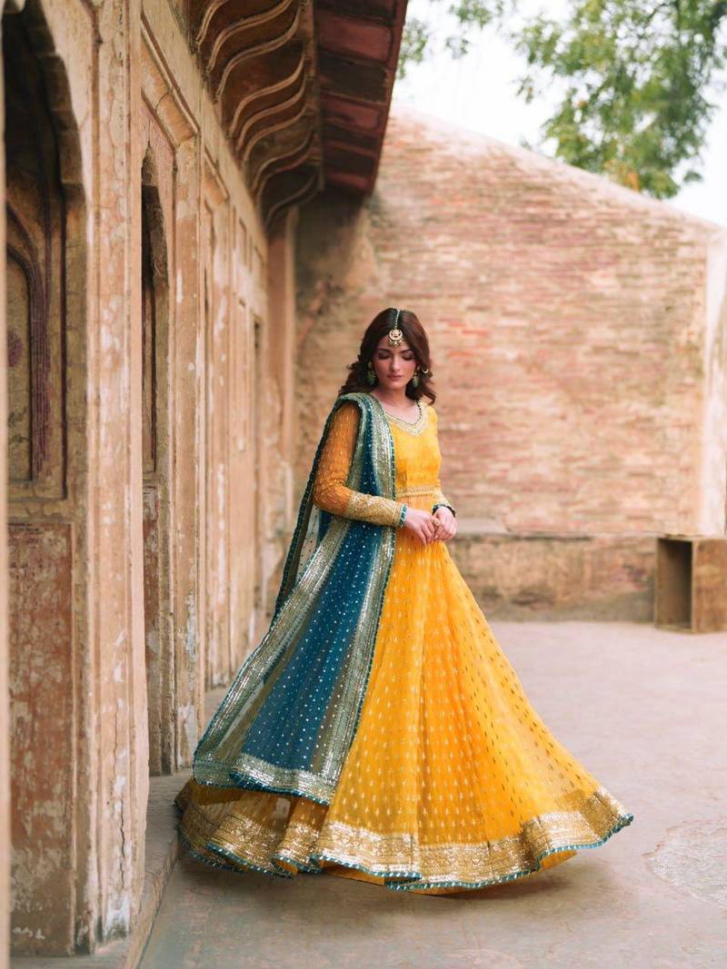 Yellow net thread flared gown set