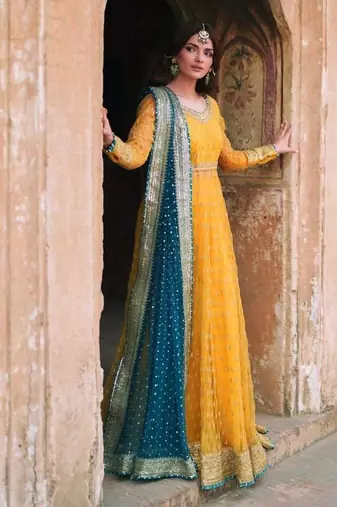 Yellow net thread flared gown set