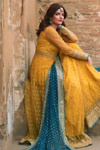 Yellow net thread flared gown set